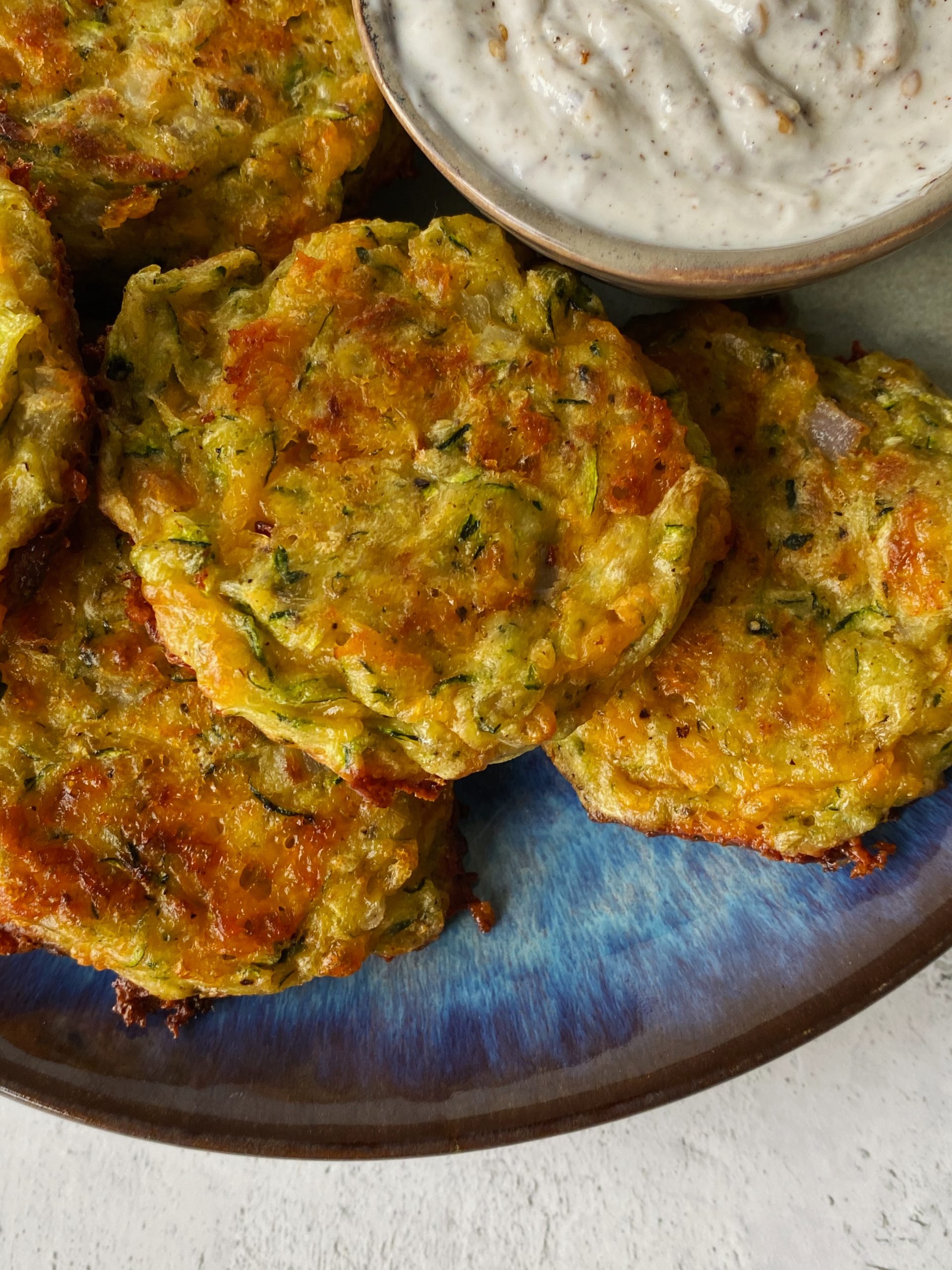 Cheddar Zucchini Fritters - Something Nutritious